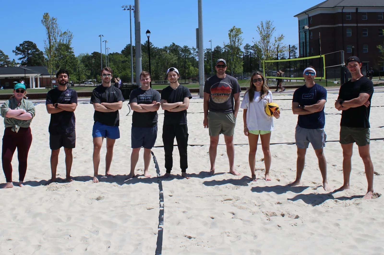 The Ohanafy team on the beach volleyball court