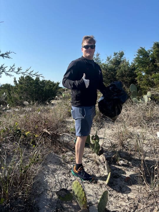 An Ohanafy employee volunteering outdoors on their personalized day
