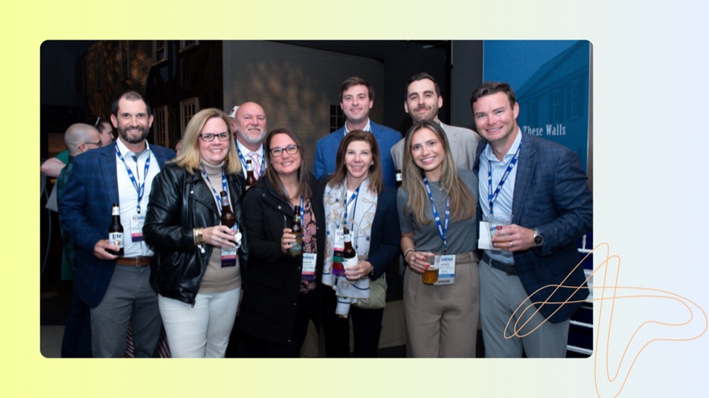 Beverage industry professionals networking at an NBWA event